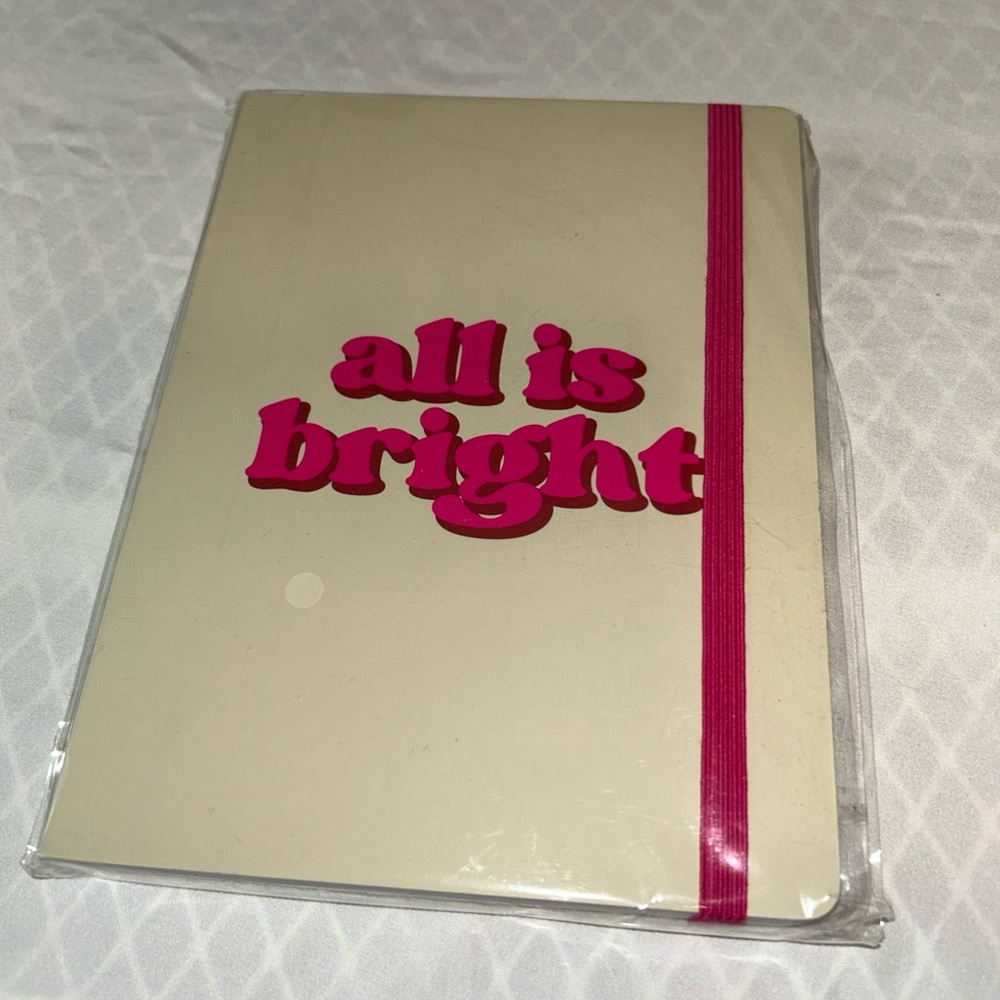 Cream Notebook with Pink Text and Band